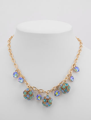 COLLAR DE FANTASÍA EN COLOR DORADO CON DIJES DE ESFERAS DE PIEDRAS EN COLOR AZUL - MICHELLE ACCESORIOS