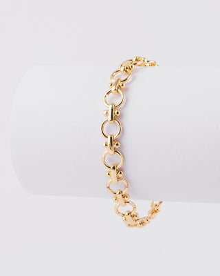 PULSERA EN CHAPA DE ORO DE CADENA TIPO FLOR COLOR DORADO CON DIJES BOLITAS Y BROCHE - MICHELLE ACCESORIOS