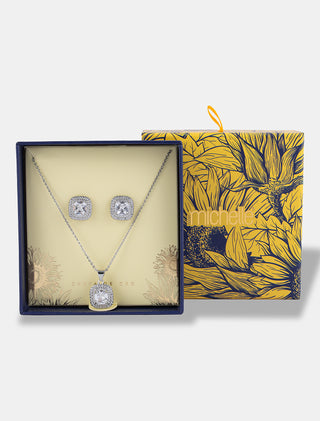 SET EN CHAPA DE ORO COLOR PLATA DE A COLECCIÓN EL ARTE DE SER MAMÁ DE ARETES TIPO BROQUEL CUADRADOS Y COLLAR CON DIJE CUADRADO CON PIEDRA BLANCA PEDRERÍA DE ZIRCONIA CON CAJA DE REGALO - MICHELLE ACCESORIOS