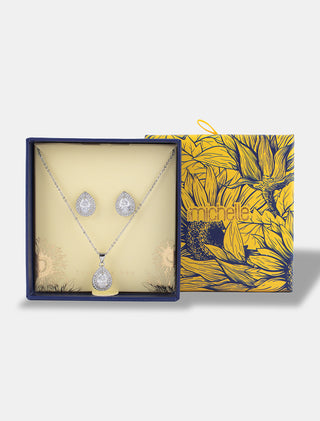 SET EN CHAPA DE ORO COLOR PLATA DE LA COLECCIÓN EL ARTE DE SER MAMÁ DE ARETES TIPO BROQUEL Y COLLAR CON DIJE DE GOTA CON PIEDRA DE ZIRCONIA INCLUYE CAJA DE REGALO PARA MAMÁ - MICHELLE ACCESORIOS