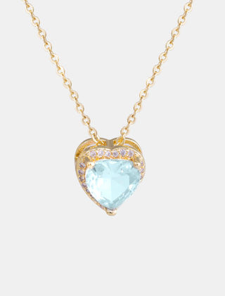 SET EN CHAPA DE ORO DE LA COLECCIÓN SAN VALENTÍN COLOR DORADO CON ARETES EN FORMA DE CORAZÓN CON PIEDRA COLOR AZUL CIELO Y COLLAR CON DIJE DE CORAZÓN AZUL CON PIEDRA DE ZIRCONIA - MICHELLE ACCESORIOS