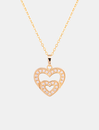 SET EN CHAPA DE ORO DE LA COLECCIÓN SAN VALENTÍN DE ARETES EN FORMA DE CORAZÓN Y COLLAR CON DIJE EN FORMA DE CORAZÓN CON PEDRERÍA DE ZIRCONIA - MICHELLE ACCESORIOS