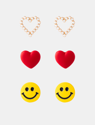SET DE 3 PARES DE ARETES TIPO BROQUELL EN FORMA DE CARITA FELIZ AMARILLA CORAZONES ROJOS Y CORAZONES CON PERLAS - MICHELLE ACCESORIOS